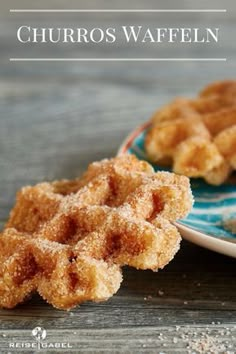 some food is sitting on a plate and next to the words churros wafflen