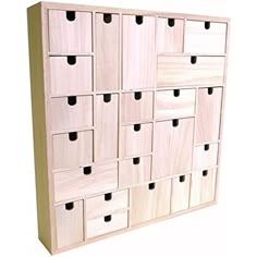 a large wooden cabinet with many drawers