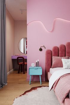 a bedroom with pink walls and furniture