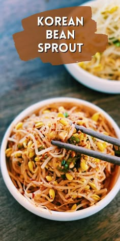 korean bean sprout noodles in a white bowl with chopsticks on the side