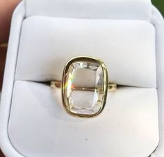 an image of a ring that is in someones hand