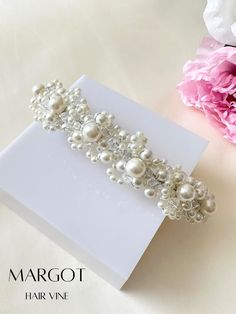 MARGOT HAIR VINE by Suri Jewelry and Accessories ✨Steeped in tradition and elegance, the "Margot Hair Vine" by Suri is a precious pearl-studded bridal accessory destined to garnish your wedding day look with an awe-inspiring allure. Carefully handcrafted and curated with the modern bride in mind, this divine hair vine is enough to make heads turn and hearts skip a beat!✨ 🌸 Intricate Craftsmanship - Every piece is handcrafted to perfection, with an extraordinary attention to detail, offering a b Pearls Hair, Pearl Hair Vine, Wedding Hair Vine, Hair Accessories Wedding, Women Hair Accessories, Bridal Accessory, Accessories Wedding, Hair Vine, Pre Wedding Photos