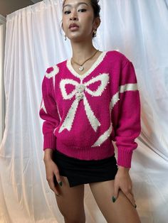 73% acrylic  19% nylon 4% wool 3% angora rabbit hair  Fits M/L Fall Sweater With Bow And Long Sleeves, Long Sleeve Sweater With Bow For Fall, Long Sleeve Fall Sweater With Bow, Pink Sweater For Winter Party, Pink Winter Party Sweater, Casual Pink Sweater For Party, Pink Sweater For Fall Party, Pink Fall Party Sweater, Winter Party Sweater