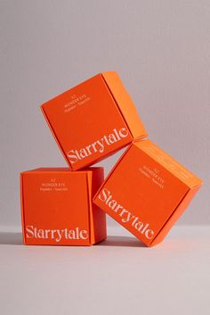 three orange boxes stacked on top of each other with the words staryrdale printed on them