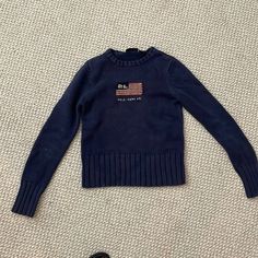 100% Cotton Vintage Ralph Lauren Sweater. Very Cute Classic Style. It’s Shrunk Over The Years So It Fits A Xs. Fading And Slight Piling. Used Condition No Damage It’s Priced High Because I Am Hesitant To Sell. I’ve Had This Sweater For A Long Time Ralph Lauren Flag Sweater, Vintage Ralph Lauren Sweater, Flag Sweater, Sweaters Vintage, Ralph Lauren Sweatshirt, Ralph Lauren Pullover, Polo Sport Ralph Lauren, Ralph Lauren Black Label, Cashmere Blend Sweater