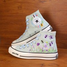 Discover the Converse Chuck Taylor 1970s, featuring exquisite embroidery of flowers and butterflies!  💸 Price includes Converse Shoes and floral embroidery as shown 🌸 You can send me your Converse/Vans shoes or I can buy them for you. We stock all the Converse and Vans shoes you want, if you want other Converse/Vans shoes in the store, please message us. Your embroidered Converse/Vans shoes will be available for shipping in 7-15 days. 🌸 I started hand embroidering on fashionable clothes and h Summer Embroidered High-top Sneakers, High Top Converse Embroidery, Black High Top Converse Embroidery, High-top Embroidered Multicolor Sneakers, Butterfly Sneakers, Converse Lace-up Sneakers With Floral Embroidery, Sneakers Wedding, Embroidered Sneakers, Embroidered Converse