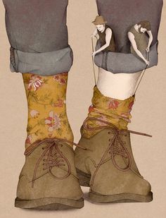 a pair of boots with flowers on them and laces tied around the soles