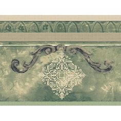 a green and white wallpaper border with an ornate design