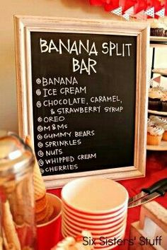 a banana split bar is set up on a table