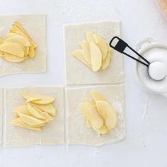 some food is laying out on the table and ready to be put in the oven