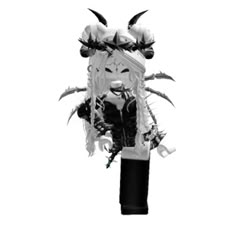 a black and white photo of a woman with horns on her head