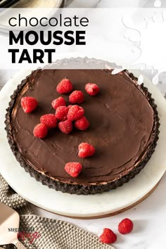 chocolate mousse tart with raspberries on top and the text overlay reads, chocolate mousse tart