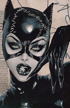 an image of a woman with catwoman makeup on her face and black cats around her eyes