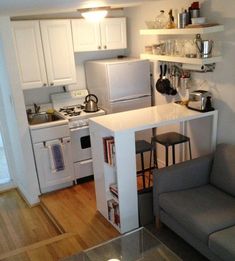 the small kitchen is clean and ready to be used as a living room or office