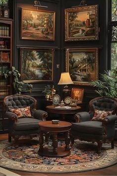 a living room filled with furniture and paintings on the wall