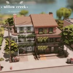 a model of a house with trees and plants on the front porch, along with a sign that says willow creek