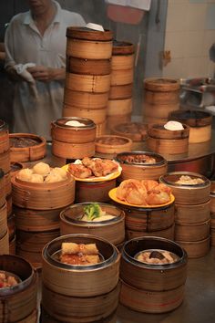 many baskets filled with food on top of a table