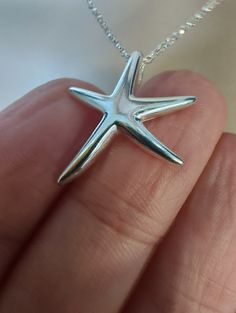 "Sterling silver starfish necklace in your choice of lengths Starfish pendant measures 19.1 mm × 22 mm Chain is a dainty yet tough Rolo link in your choice of lengths. Shown in 16\" on a size small mannequin. All parts of this necklace are solid 925 sterling silver. Packaged in a small gift box tied with ribbon." Silver Starfish Necklace, Jewellery Silver Necklace, Small Mannequin, Starfish Pendant, Starfish Necklace, Silver Jewelry Necklace