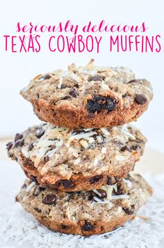 three oatmeal chocolate chip cookies stacked on top of each other with coconut flakes