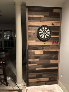 a dart board mounted to the side of a wall