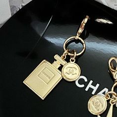 Chanel Holiday Charm. Only In Boutiques For Limited Time During The Holidays. Listing For One “Ask For The Moon” Perfume Bottle Novelty Charm Includes Small Packaging Ready For Gift Giving!!! Charm Is On A Removable Clasp See Pictures Of Different Charms And Ideas (All Not Included) You Get: (1) One Engraved Perfume Bottle Charm In A.. Authentic Chanel Black Fold Collapsing Box With Matching 2022 Holiday Red & Gold Sparkly Ribbon Bow Super Quality As Only To Be Expected From Chanel, Beautiful Go Moon Perfume, Engraved Perfume, Chanel Charms, Chanel Perfume Bottle, Chanel Pendant, Matte Gold Necklace, Perfume Necklace, Small Packaging, Chanel Necklace