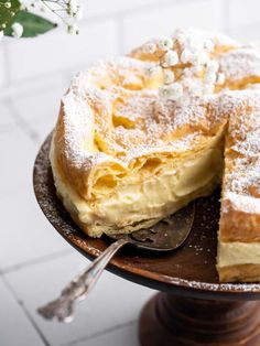 a cake sitting on top of a wooden plate