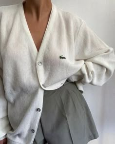 Experience the perfect blend of aesthetic vibes and comfy style with Lacoste white shirt and grey shorts ensemble. Embrace the comfort of these stylish and comfortable clothes. Mode Ulzzang, Lily Rose Depp, White Cardigan, Looks Style, Marie Antoinette, Outfits Casuales, Fashion Killa, Art Director