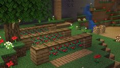 an image of a minecraft garden with lots of flowers and plants in the ground