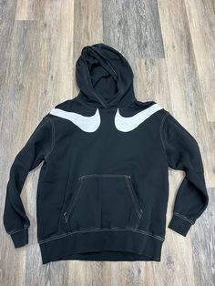 Brand: NIKE APPAREL Style: ATHLETIC SWEATSHIRT HOODIE Color: BLACK Size: S SKU: 137-137213-1482 CONDITION: GENTLY USED Trendy Sports Hoodie With Logo Print, Urban Black Hoodie With Logo Print, Black Oversized Hoodie Athleisure Style, Black Oversized Hoodie In Athleisure Style, Black Graphic Print Sweatshirt For Gym, Oversized Black Hoodie For Sports, Black Sports Hoodie Sweatshirt, Casual Logo Print Sweatshirt For The Gym, Black Sports Season Top With Drawstring Hood