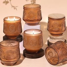 a group of candles sitting next to each other