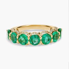 Traditionally loved emeralds sit in a row atop this 14k yellow gold ring. To make the piece a true stunner, a hidden diamond halo adds sparkle from every angle. Diamond Halo Ring, Pretty Jewelry, Halo Diamond Ring, Yellow Gold Ring, Halo Ring, Halo Rings, Diamond Halo, Precious Gemstones, Pretty Jewellery