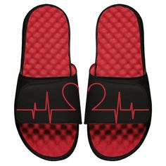 a pair of red and black slides with the number 22 on it