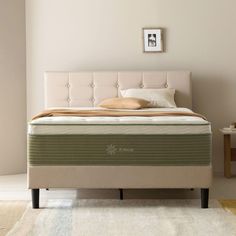 the mattress is made up and ready to be used in the bedroom or as a bed