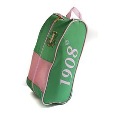 a green and pink duffel bag with the words 2000 on it's side