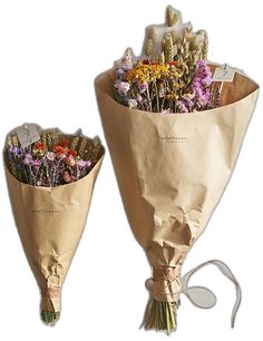 two bouquets of flowers wrapped in brown paper