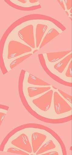 an orange slice is shown on a pink background