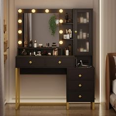 a vanity with lights on it in a bedroom