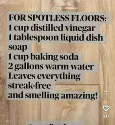 a sign that reads for spotless floors i cup distilled vinegar soap, 1 cup baking soda, 2 globs warm water leaves every