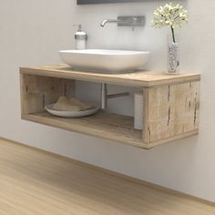 a bathroom with a sink and wooden shelves