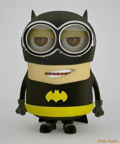 a cartoon character with big eyes and a batman costume on, standing in front of a white background