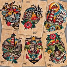 four old school tattoo designs on paper with flowers and ships in the middle one has an anchor