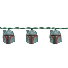 star wars boba fett helmet string lights hanging from a green wire on a white background