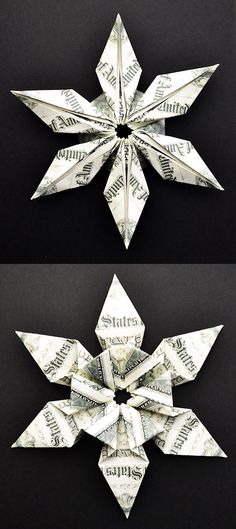 origami snowflake made out of dollar bills on black and white background