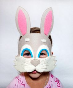 Bunny kids mask will be a great addition for halloween costume.  This bunny masquerade mask is good for Halloween costume or for New years eve cosplay party .  MATERIALS Our masks are made by hand from high quality korean felt.  SIZE - fof kids height - 5 inch (13 cm) with ears -  8,7 inch (22 cm) width - 7 inch (18 cm)   SEE MORE UNIQUE MASQUERADE MASKS  on https://www.Ballwool.com/shop/ColorGlassShop   CUSTOMIZATION You can make a custom oder -  individul size, design or shape of mask. Just us Bunny Mask Halloween Costume, Rabbit Mask, Bunny Mask Halloween, Rabbit Mask For Kids, Easter Bunny Mask Craft, Bunny Face Mask, Rabbit Costume, Felt Mask, Full Face Mask