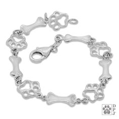 a dog bone and paw charm bracelet on a white background