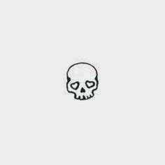 a black and white drawing of a skull