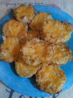 some fried food is on a blue plate