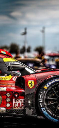 the cars are lined up on the race track