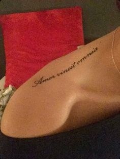 the back of a woman's neck with an inscription on it that reads, never wait