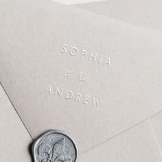 a wax stamp on an envelope with the words sophia and andrew written in it